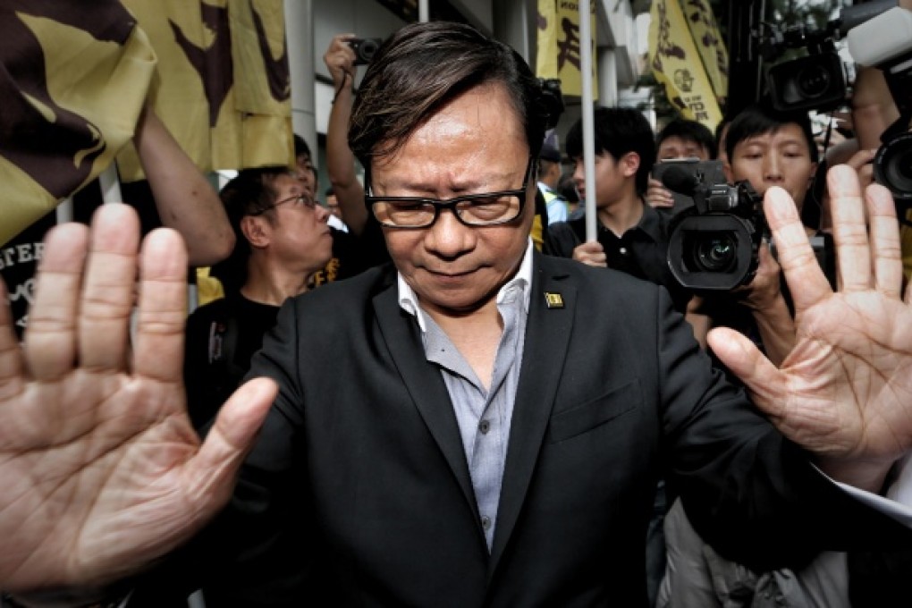 Wong Yuk-man leaves Eastern Court yesterday after being sentenced to six weeks in prison, suspended for 14 months. Photo: Sam Tsang