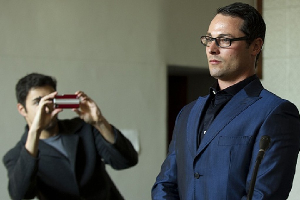 Carl Pistorius, the older brother of South African Olympic sprinter Oscar Pistorius, stands at Vanderbijlpark Magistrate's Court. Photo: AFP