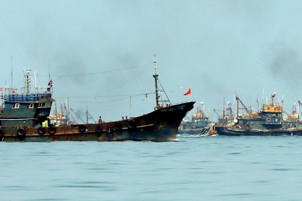 Chinese boats, some flying North Korean flags, allegedly fish illegally in South Korean waters on May 2. Photo: EPA