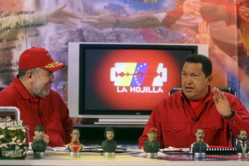 Venezuela's then President Hugo Chavez (right) appears on the television show with anchor Mario Silva in 2007.