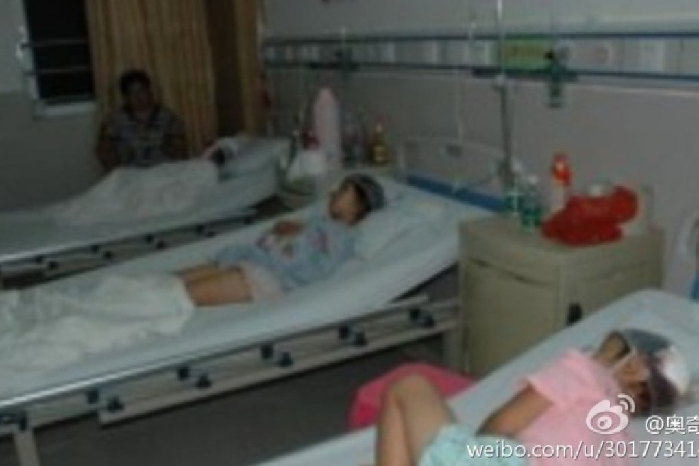 Victims with head-wounds receive treatment at a Maoming hospital on Tuesday. Photo: Screenshot via Sina Weibo