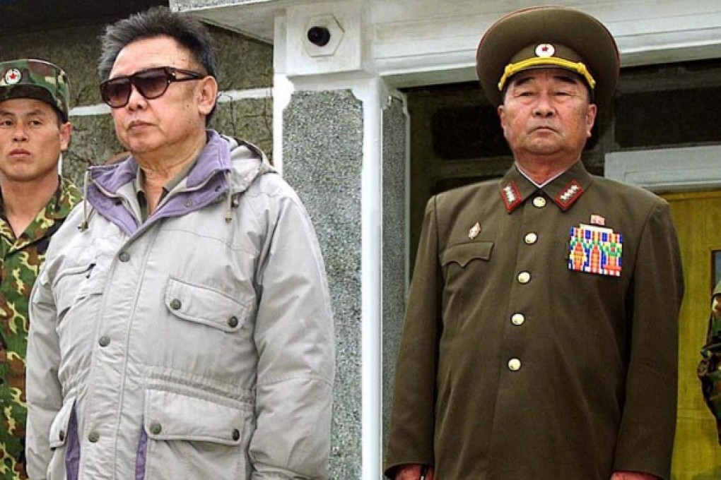 Gereral Kim Kyok-sik (right) with former North Korean leader Kim Kong-il. Photo: AP