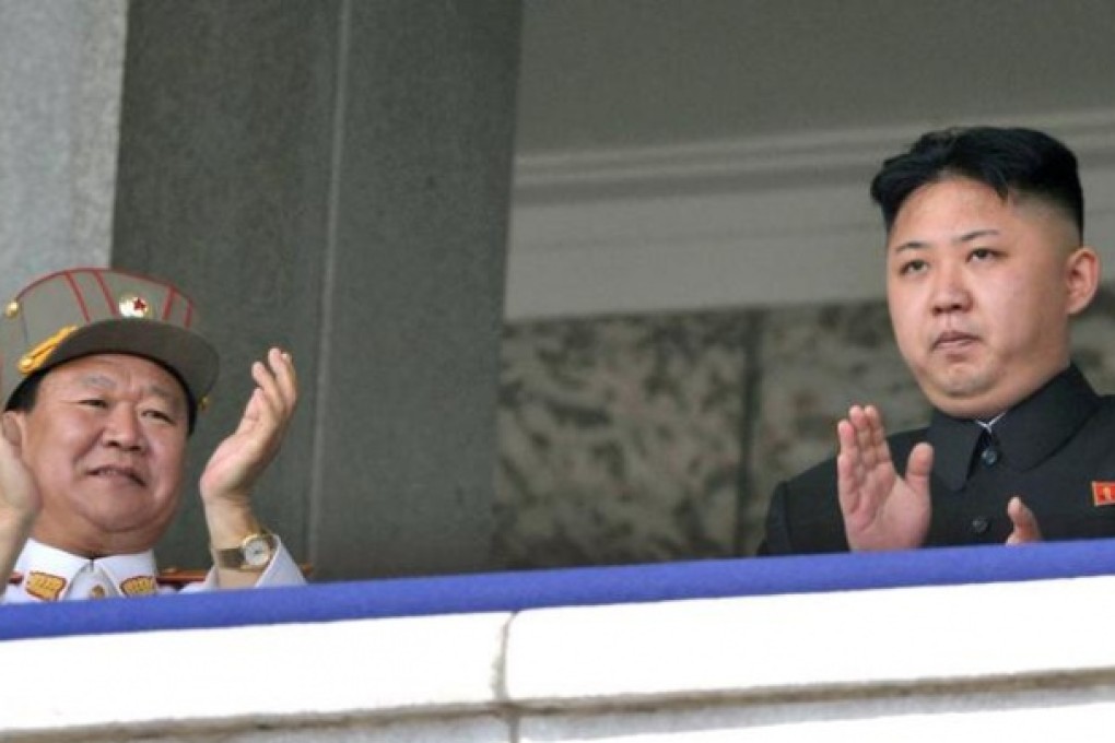 North Korean leader Kim Jong Un (right) with senior military official Choe Ryong Hae (left), who on Wednesday flew to China. Photo: AP