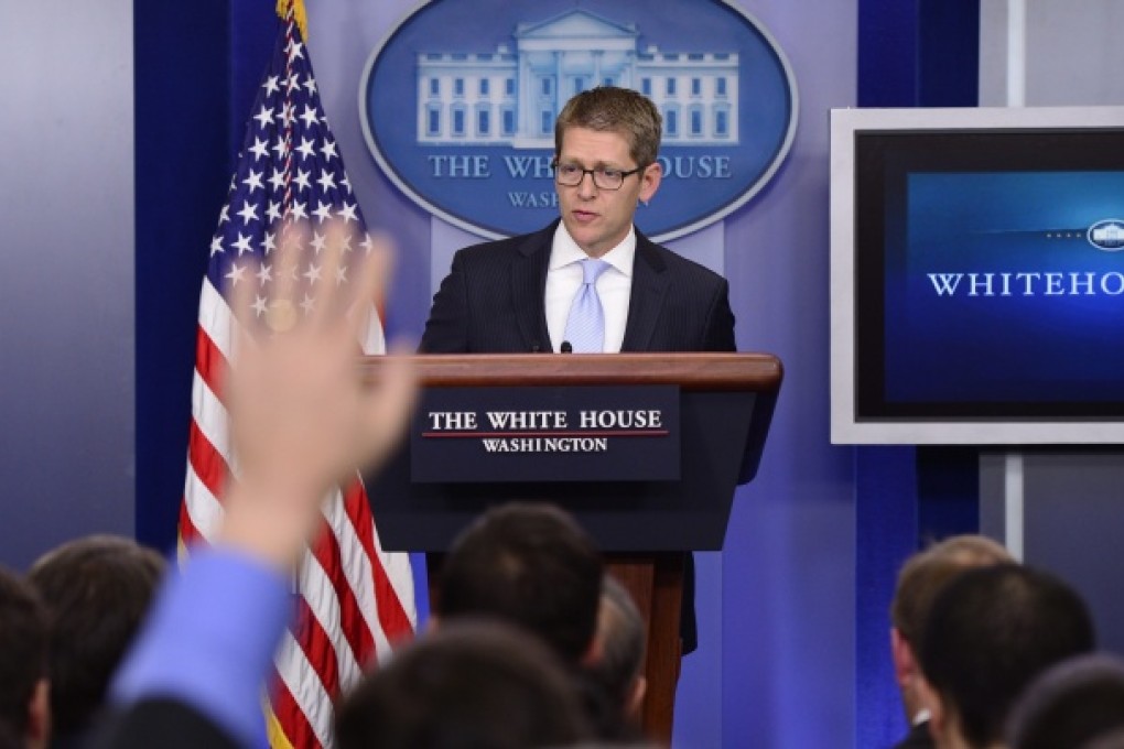 US White House press secretary Jay Carney takes questions from journalists during a press conference in Washington DC, on May 14, 2013. Photo: EPA