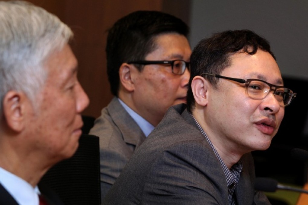 Law don Benny Tai (right) unveils details of deliberation days that advocate direct participation by citizens. Photo: May Tse