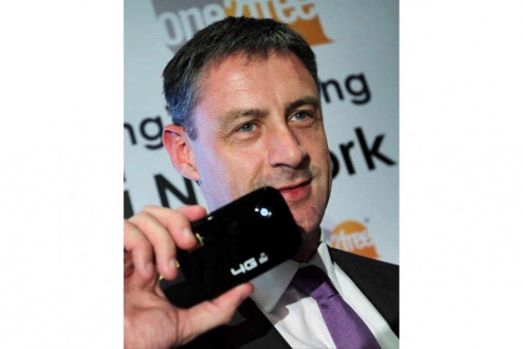 CSL chief Phil Mottram shows off the pocket Wi-fi router.