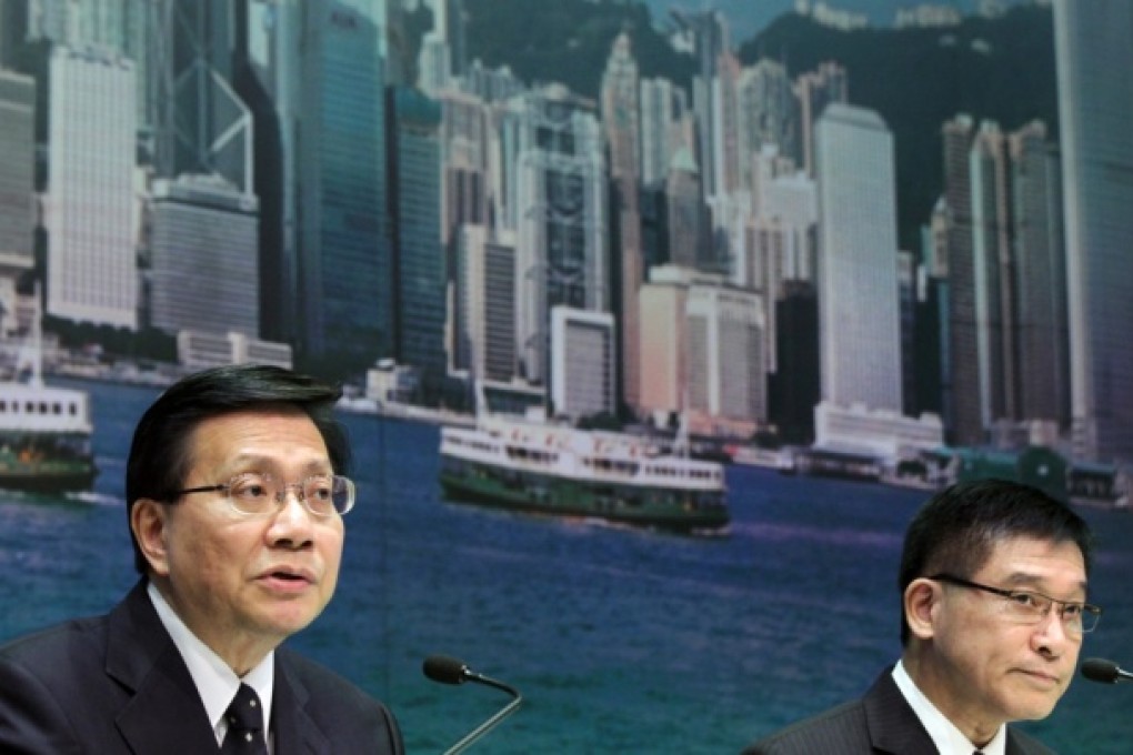 Anthony Cheung Bing-leung (left), secretary for Transport and housing and, Francis Liu (right), director of Marine attend a press conference about a report of the Commission of Inquiry into the National Day ferry disaster off Lamma island at government headquarters, Tamar. Photo: Dickson Lee