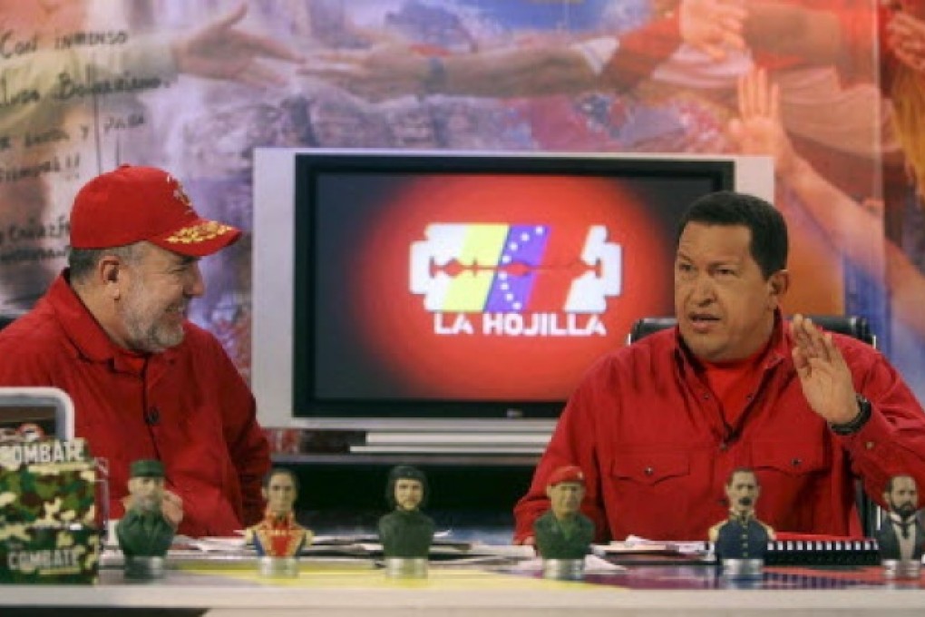 Then Venezuelan president Hugo Chavez appearing on television with anchor Mario Silva in Caracas in 2007. Photo: AP