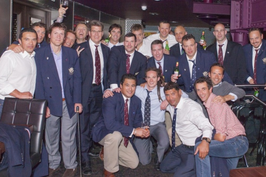 Andy Fields (third left) and many of the 60 players who received caps from the HKRFU at a function in London's Hippodrome casino. Photo: SMP
