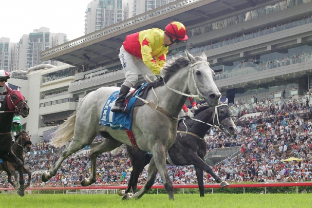 Matthew Chadwick has time to look behind at his rivals after California Memory unleashed his usual swift turn of foot in the final 200m to win the day's feature event. Photo: Kenneth Chan