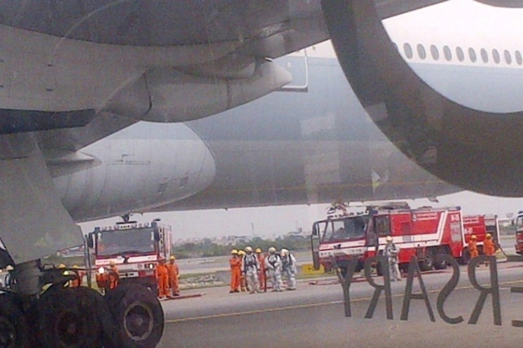 A passenger's picture of the scene after the Boeing 777 made an emergency landing. Photo: Red Door News
