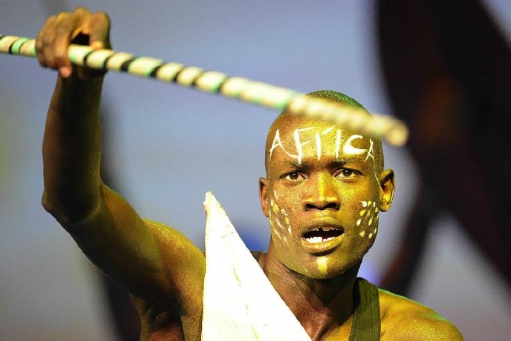 A South Sudanese tradtional dancer entertains guests during the celebrations to mark the 50th anniversary of the African Union in Addis Ababa yesterday. Photo: AFP