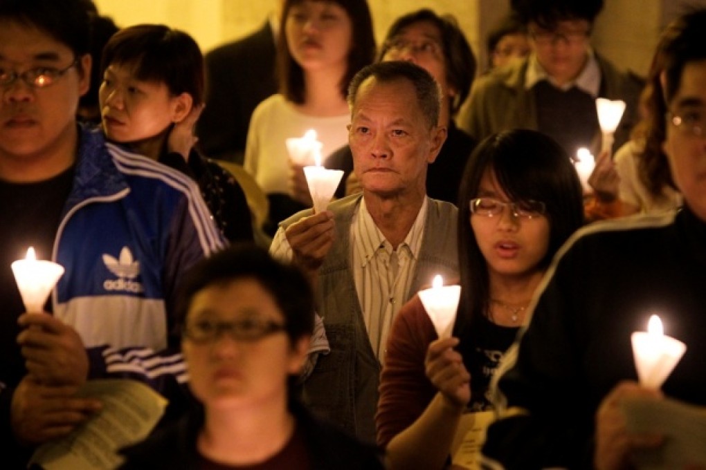 A group of Catholics holds a prayer in Hong Kong. Photo: K. Y. Cheng
