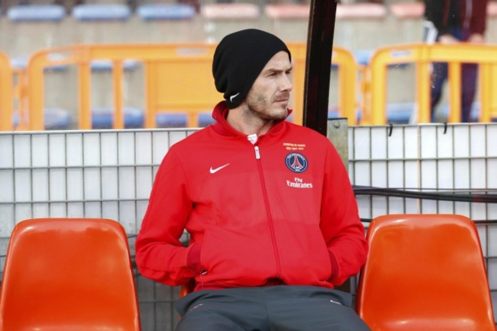 David Beckham on the bench