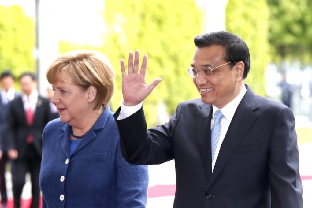 A united front. Both German Chancellor Angela Merkel and Chinese Premier Li Keqiang say they want to head off a trade war. Photo: Xinhua