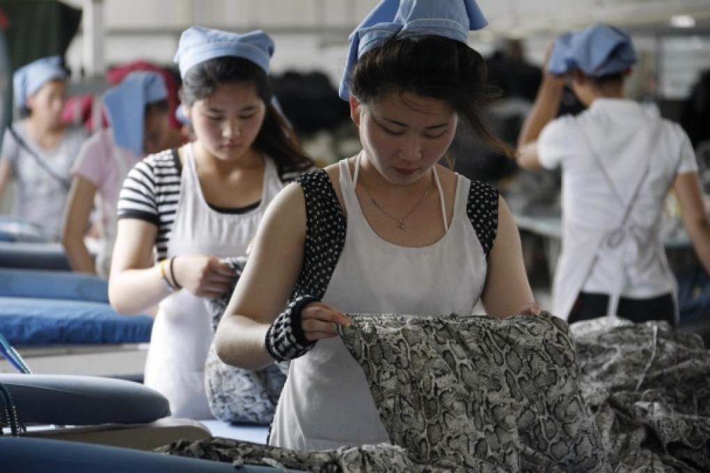 Despite indications that wage rises are easing, manufacturers remain worried about a shrinking supply of workers. Photo: AFP