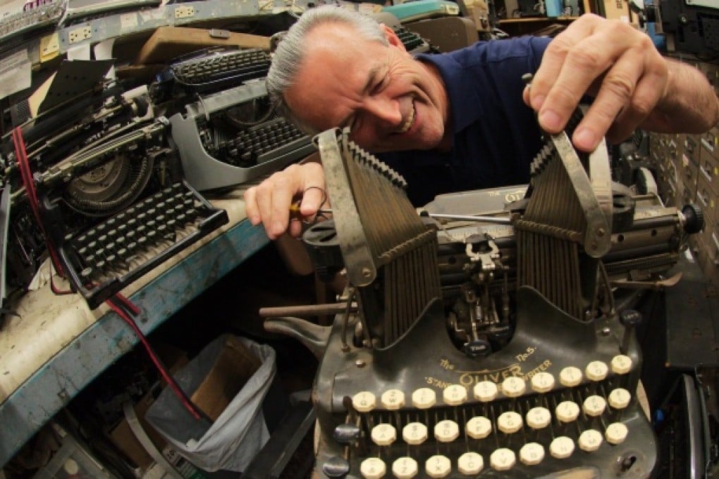 Ermanno Marzorati at work. His restorations include the machine on which Orson Welles wrote the script for Citizen Kane. Photo: AFP