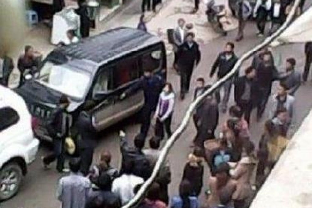 Pictured: The Chinese teen 'handcuffed' over spilt cola, triggering police probe