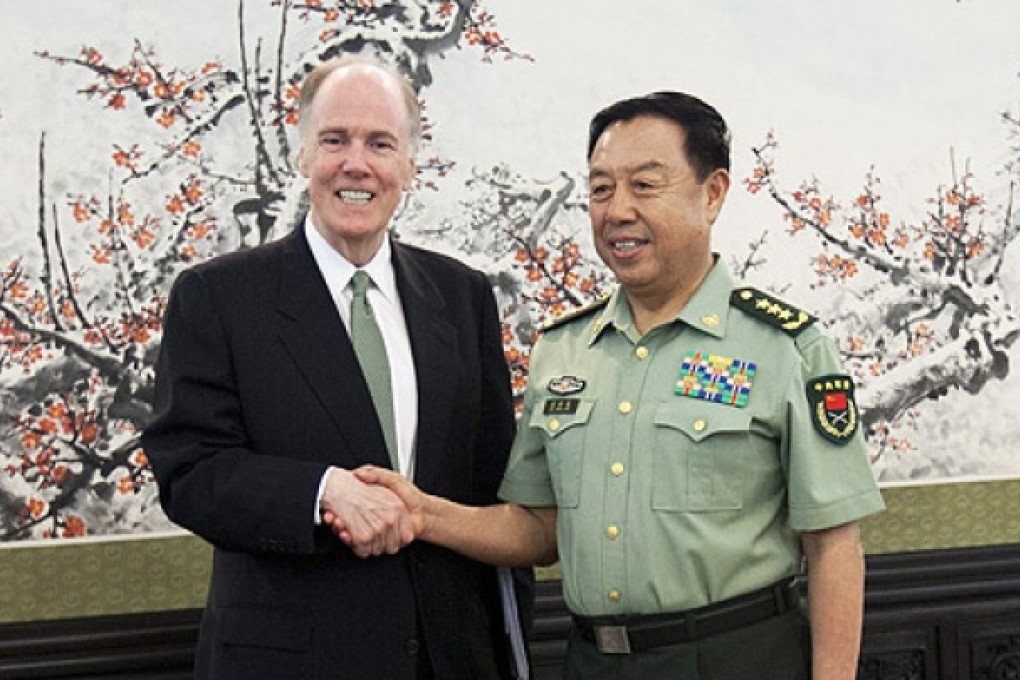 US National Security Adviser Tom Donilon (left) shakes hands with General Fan Changlong, vice chairman of China's Central Military Commission, at the Bayi Building, in Beijing, on Tuesday. Photo: EPA