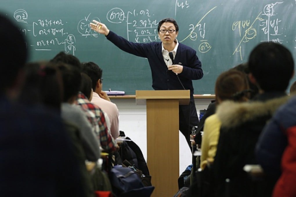 A teacher gives a lecture at a cram school in a Goshichon in Seoul. Photo: Reuters