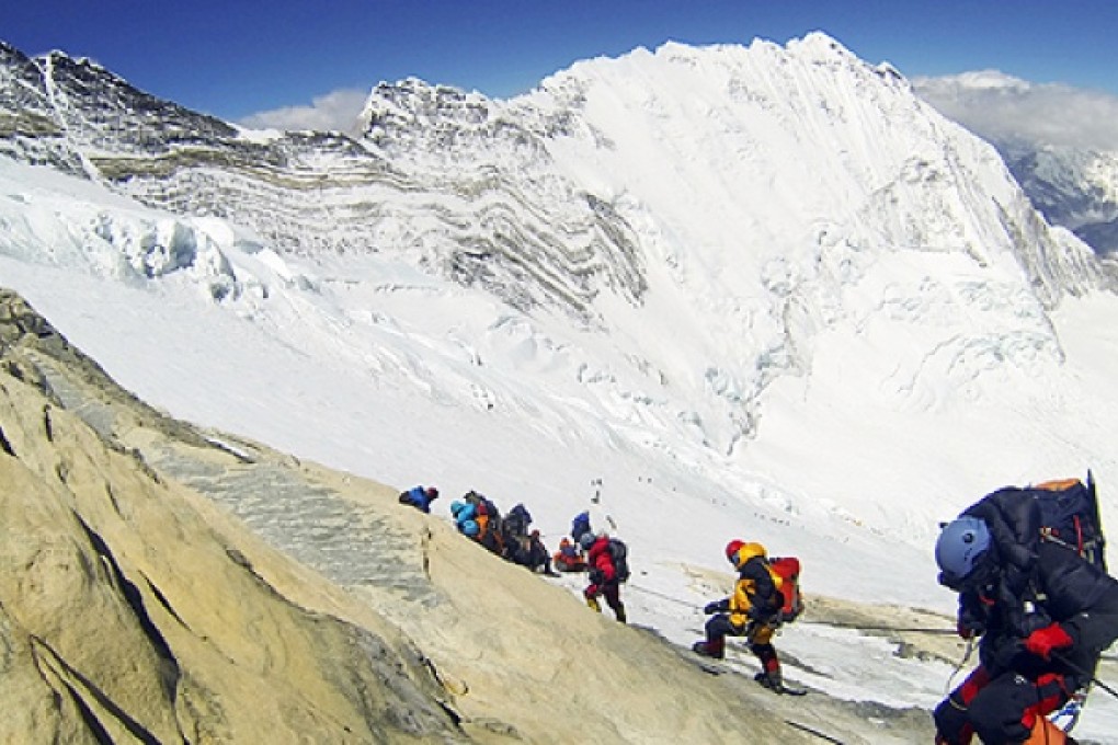 Climbers descend towards Mount Everest's Camp 4 on their way to the summit. The death toll from this year’s climbing season has now reached 16. Photo: AP