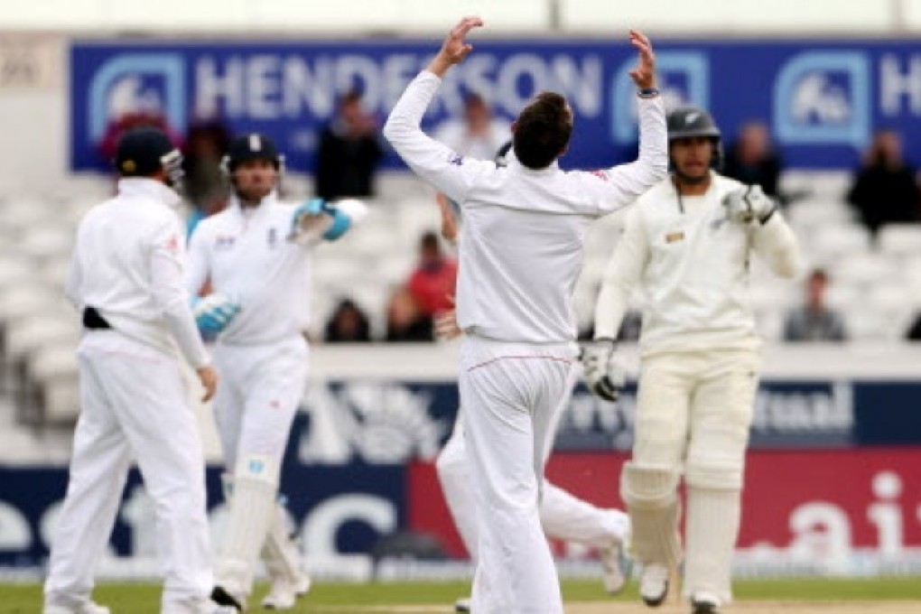 England's Graeme Swann, celebrates after bowling out New Zealand's Ross Taylor, on the fourth day of the second Test match between England and New Zealand in Leeds, England. Photo: AP