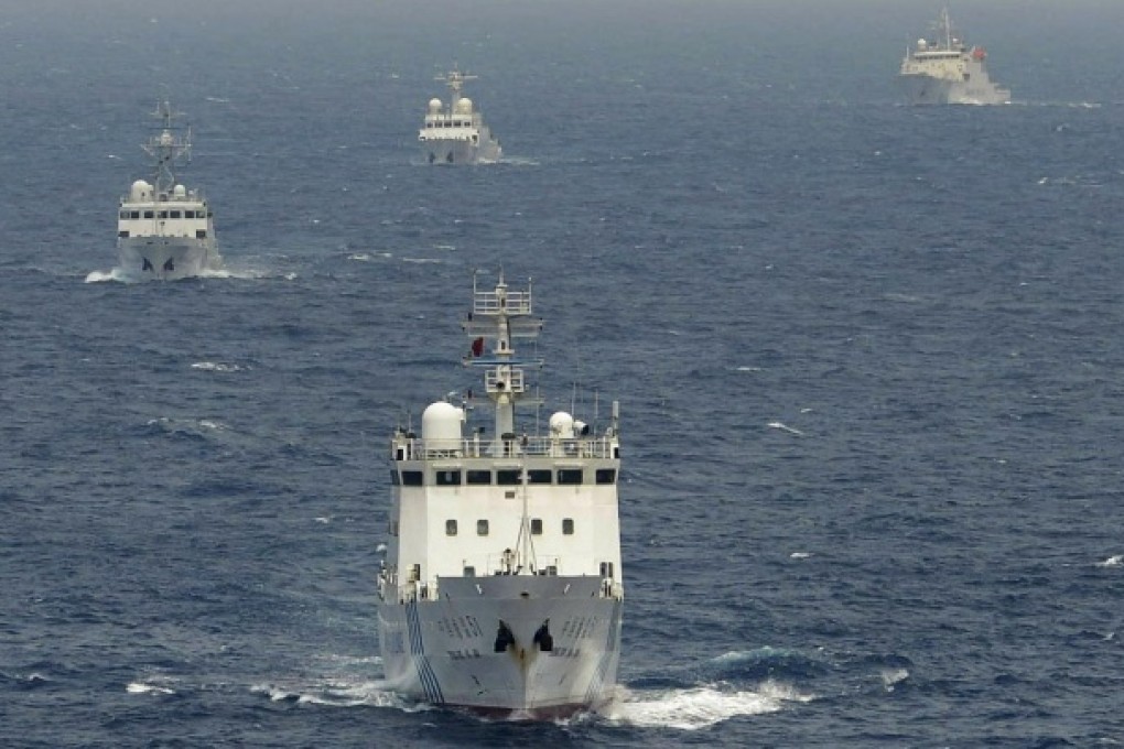 Chinese surveillance ships sail through disputed waters in the East China Sea. Photo: AP