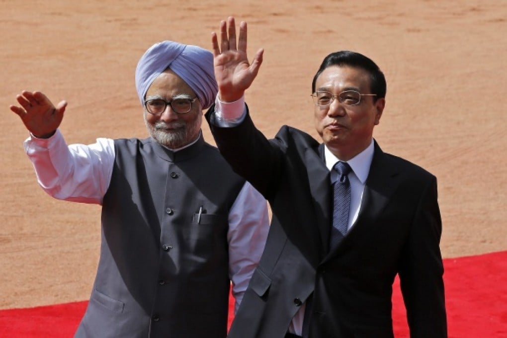 India's Prime Minister Manmohan Singh (left) and Chinese Premier Li Keqiang.