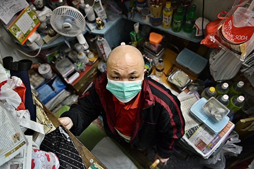 Mr Lo rents a cubicle in Kwun Tong with poor ventilation. Photo: Thomas Yau