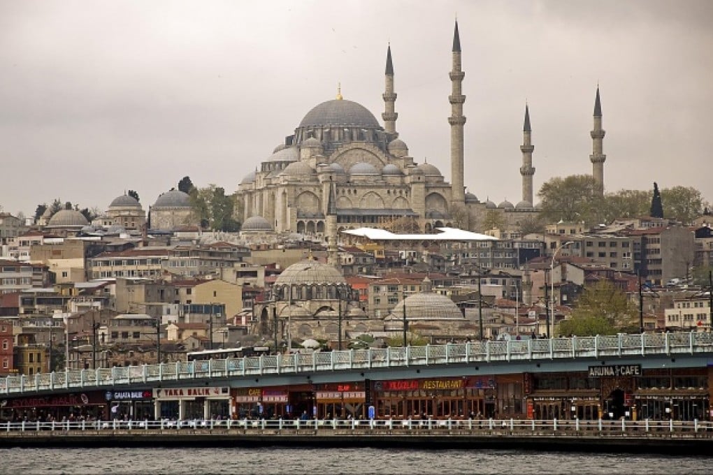 Hagia Sophia towers above Galata Bridge.