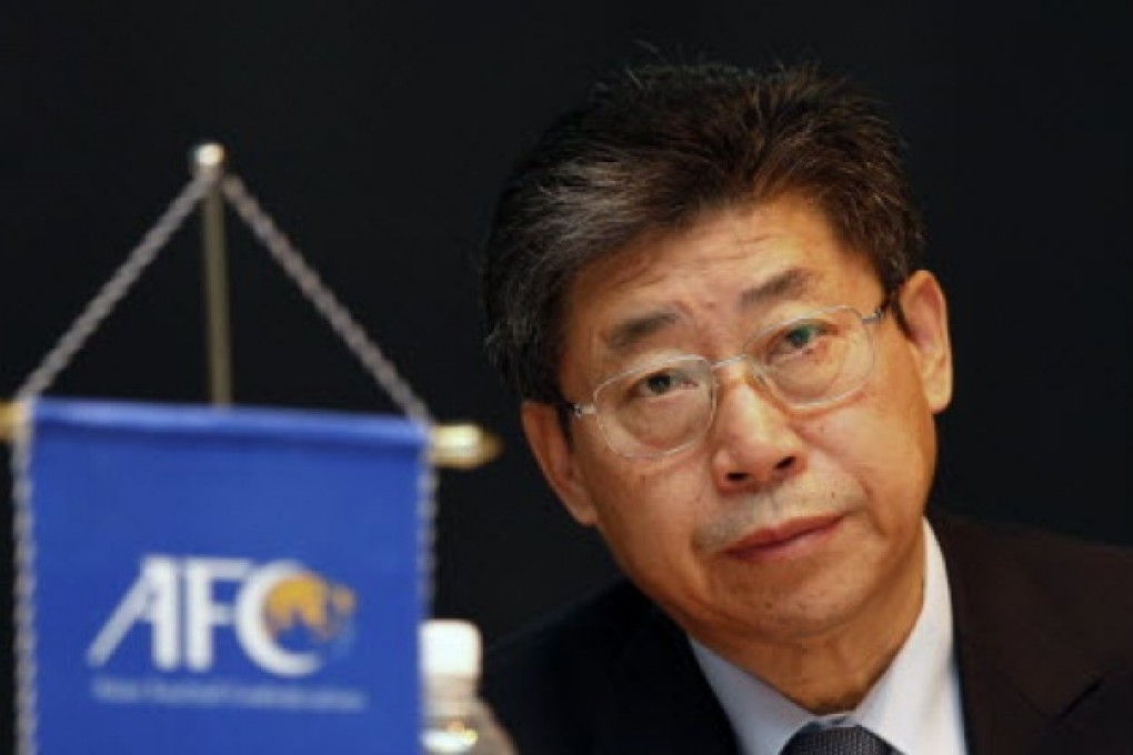 Asian Football Confederation Acting President Zhang Jilong listens to a reporter's questions during an Interpol conference to discuss match-fixing, in Kuala Lumpur, Malaysia. Photo: AP