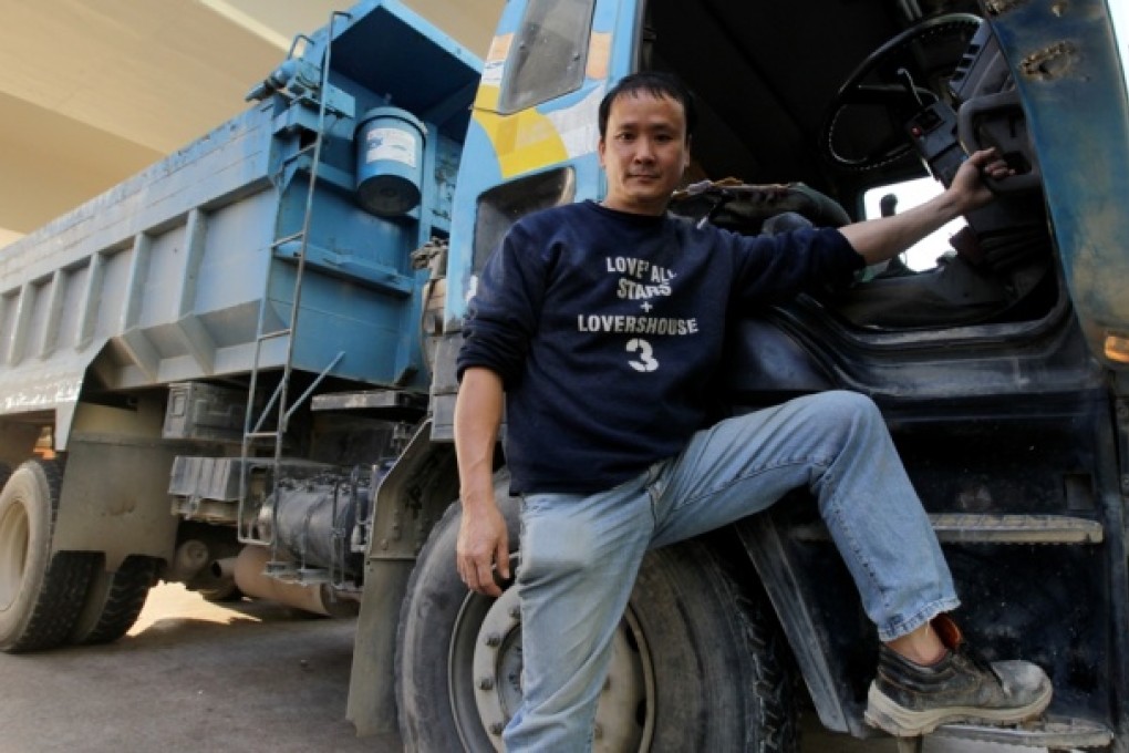 Lau Wai-kei, driver and owner of dump truck says the government should not introduce a blanket policy on phasing out old and polluting commercial diesel truck. Photo: Edward Wong