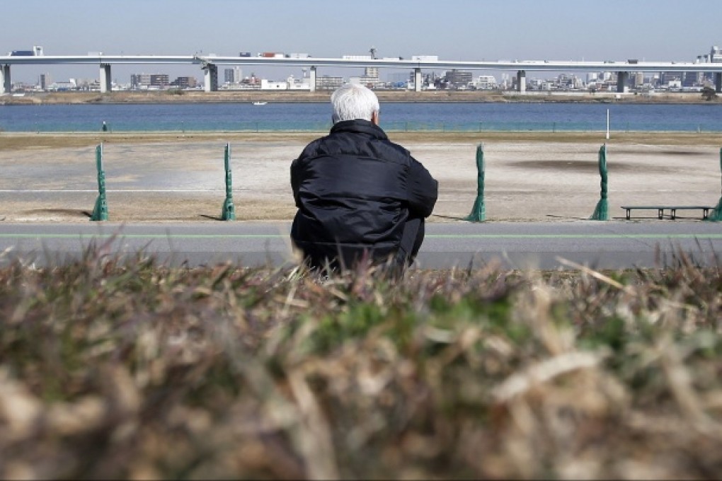 If Tokyo's Arakawa River breaks its banks in a storm, about 2,000 people are likely to be killed and 860,000 would be stranded, the government says. Photo: Bloomberg