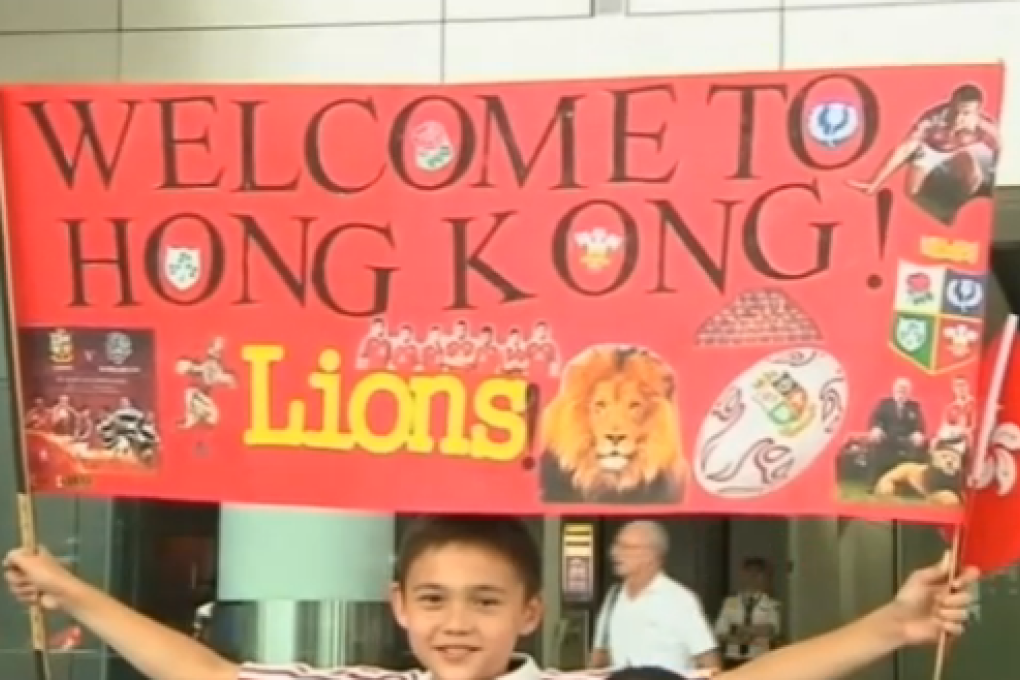 Warm hugs, Lions. Photo: Screenshot from Guardian video (below)