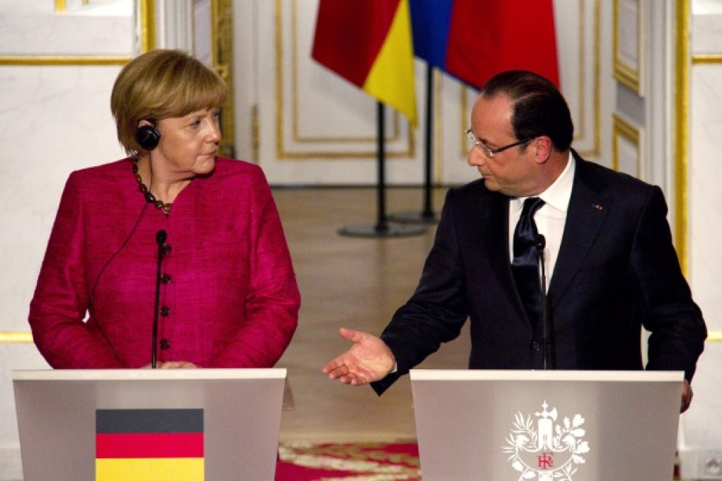 German chancellor Angela Merkel (left) wants President Francois Hollande to undertake structural reforms, including cutting public spending, revamping pensions and cutting labour costs. Photo: Xinhua