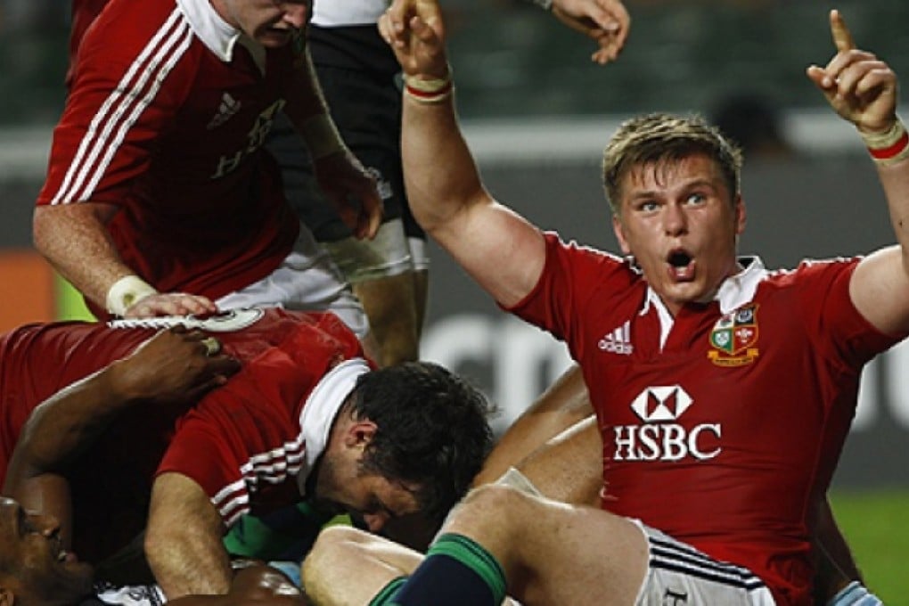 Owen Farrell (right) celebrates after his team scored a try during the first half. Photo: Reuters