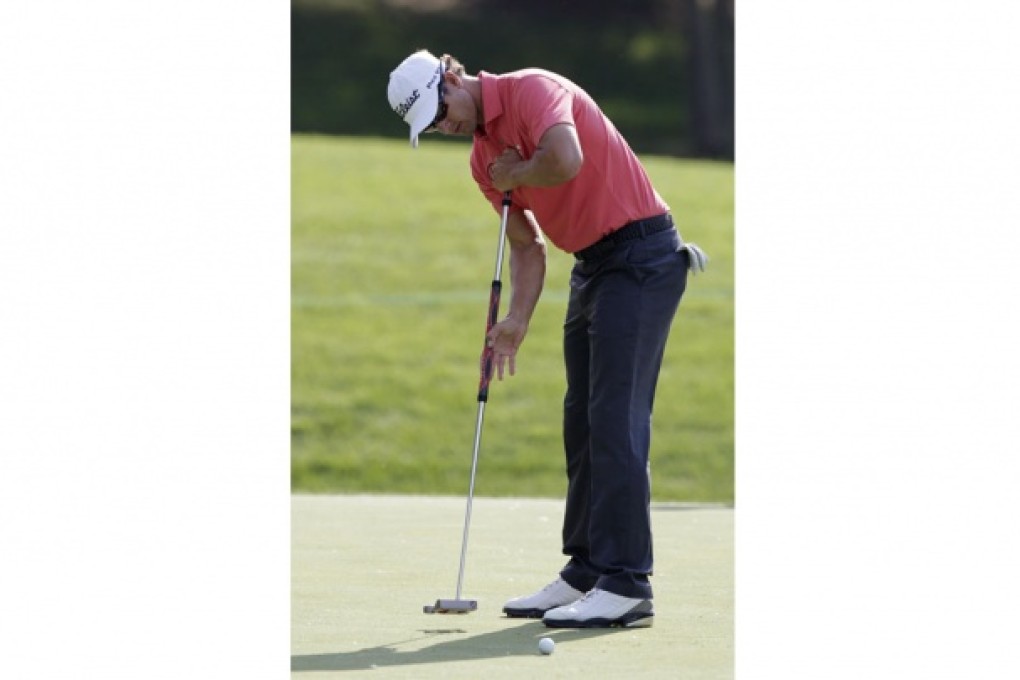 Adam Scott has sought legal advice over the putting ban. Photo: AP