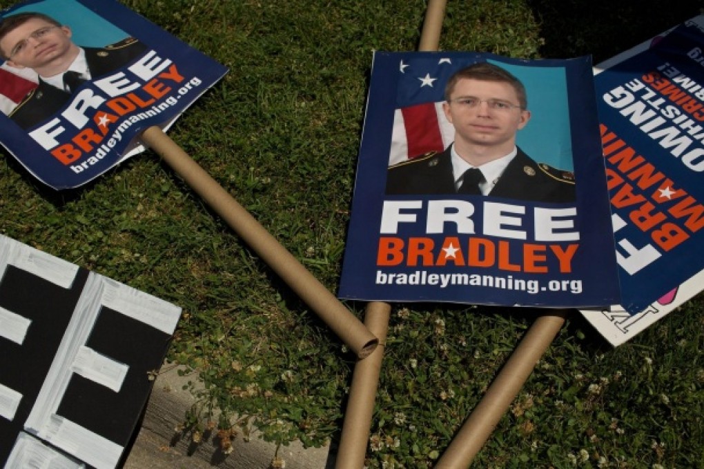 Signs supporting Bradley manning lie on the ground after hundreds of his backers marched in Fort Meade, Maryland, at the weekend. Photo: AFP