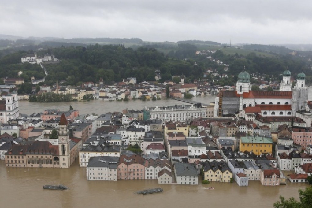 Raging waters from the Danube and two other rivers flood large parts of the southeast German city of Passau after heavy rainfall. Photo: AP