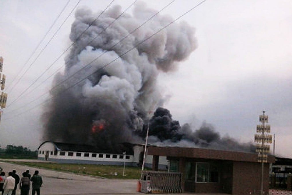 Black smoke billows from the poultry processing plant after explosions were heard. Photo: Screenshot via Sina Weibo