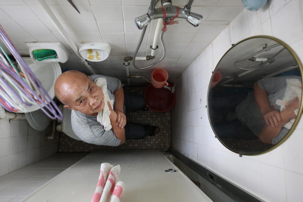 Wong Chong-choi, 72, says his washroom and toilet is so small that he won't even be able to use it when he becomes frail. Photo: David Wong