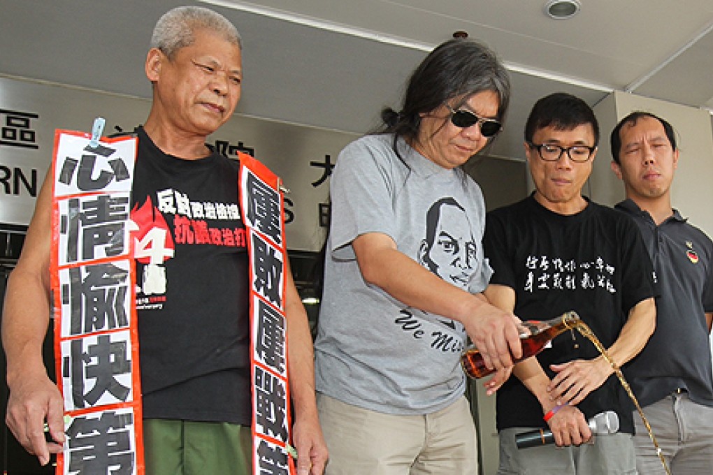 Social activist Koo Sze-yiu with supporters outside Eastern Court on Monday morning. Photo: Dickson Lee