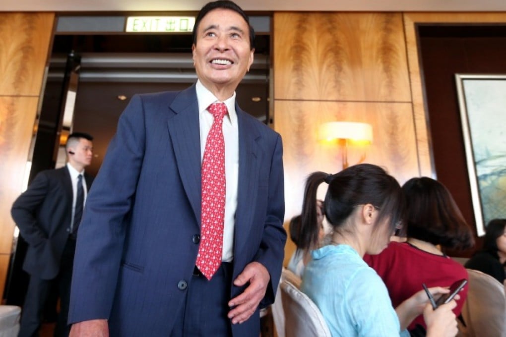 Chairman Lee Shau-kee, at Henderson's annual general meeting yesterday, says developers' profits will be squeezed. Photo: Sam Tsang