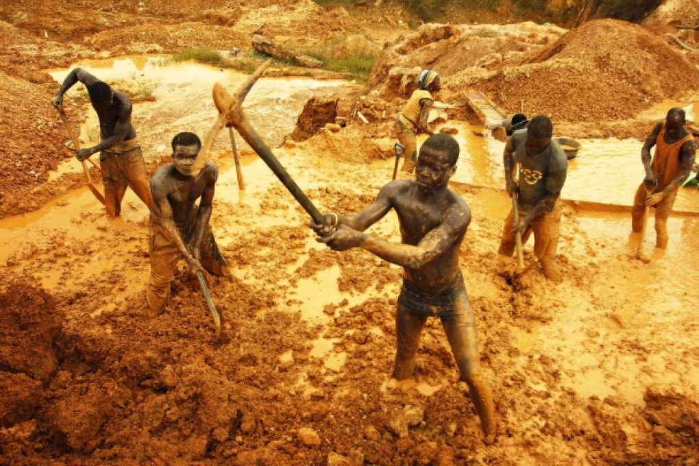Artisanal miners dig for gold in an open-pit concession in western Ghana. Photo: Reuters