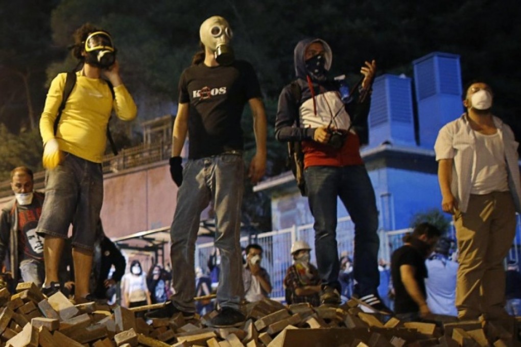 Protesters on a barricade in Istanbul. Photo: Reuters