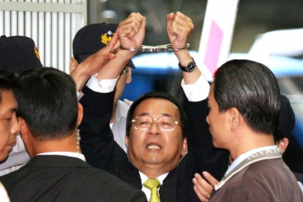 Taiwan's ex-president Chen Shui-bian shouting 'Political Persecution' following sentencing at Taipei District Court in Taipei, Taiwan. Photo: EPA