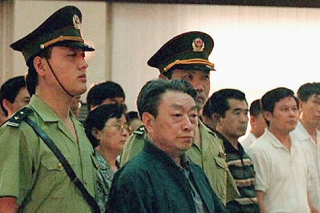 Former Beijing mayor Chen Xitong stands in Beijing's Municipal Higher People's Court in 1998 when he was sentenced to 16 years in jail for his part in a graft scandal. Photo: AP