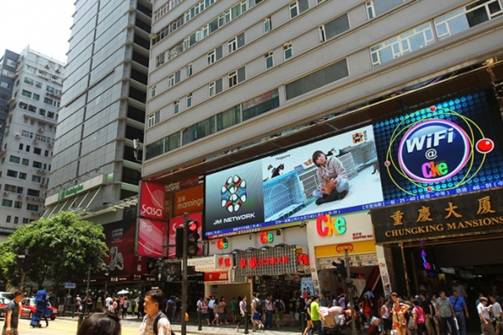 Chungking Mansions in Tsim Sha Tsui attracts bargain travellers and Wong Kar-wai fans. Photo: Edward Wong
