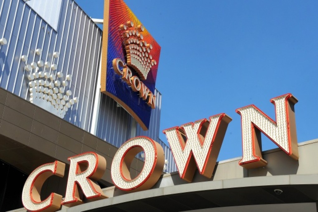 Crown Casino signs displayed on the side of the casino in Melbourne. Photo: AFP