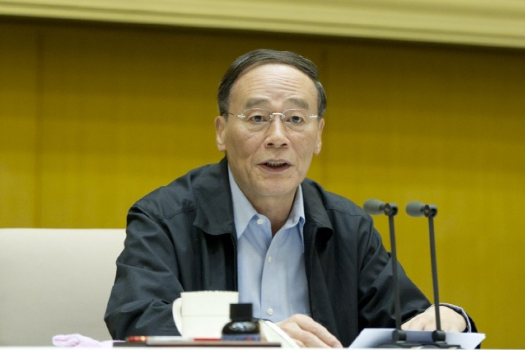 Wang Qishan, secretary of the CPC Central Commission for Discipline Inspection, addresses a meeting promoting an anti-corruption campaign. Photo: Xinhua